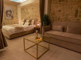 kadarim Boutique Suites-beachfront Zimmer, hotel cerca de Playa Carmel, Haifa