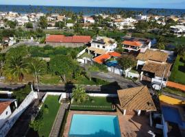 Casa Vilas do Atlântico, 3 quartos próximo a praia, hotel in Lauro de Freitas