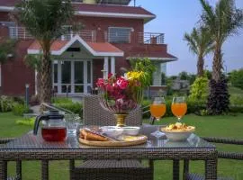 StayVista at Hillside Paradise 4BHK Villa with Jacuzzi, kids play area, view of Aravalli Hills