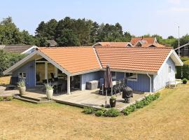 8 person holiday home in Rudk bing, familiehotel i Spodsbjerg