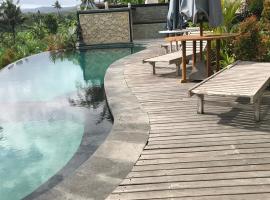 The Green ujung Villa, hospedagem domiciliar em Ujung