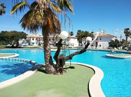 Charmant rez-de-chaussée et piscine bar-restaurant, lägenhet i Alicante