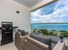 Breath Taking Beach Front Views Condo Eagle Beach, דירת שירות בפאלם-איגל ביץ'