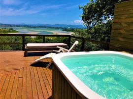 Chal&eacute;s e Bangal&ocirc;s Ibiraquera, pr&aacute;zdninov&yacute; dům v destinaci Barra de Ibiraquera