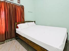 SPOT ON 91771 Homestay Bang Haji, hotel in Praya