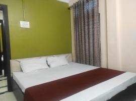 Homecation SP Lodge, hotel di Nowgong