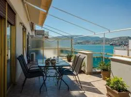 Cozy seaside penthouse with sea & mountain view.