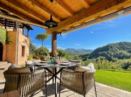 Val di Codena - Holiday Home, hotel con estacionamiento en Vetto