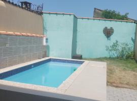 Casa de Praia com piscina, holiday home in Mongaguá