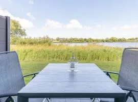 Ferienwohnung Nordseetraum direkt am Nordseedeich mit Blick auf den See