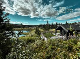 Unique cabin with fantastic lake view, sauna, ski & EV outlet, hotel di Svingvoll