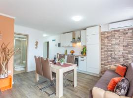 Apartment in Njivice with sea view, balcony, air conditioning, WiFi (4930-1), hotel in Njivice