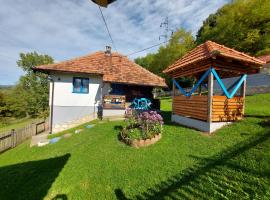 Seosko domaćinstvo Alababa, cabaña o casa de campo en Kosjerić