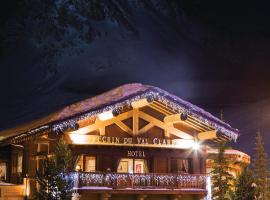 Chalet Hotel L’Ecrin، فندق في تينيِ