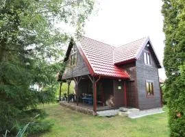 Wooden House by Lake Radunskie, Poland