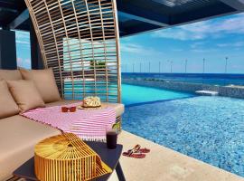 Singular Dream Beach Residences โรงแรมในปลายาเดลการ์เมน