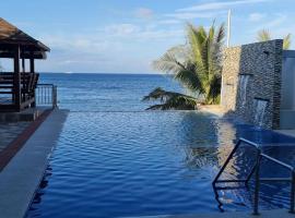 Beachfront Vacation Villa with Infinity Pool, hotel en Batangas