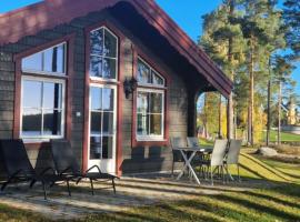 Lakeside log cabin Främby Udde Falun, hotel keluarga di Falun