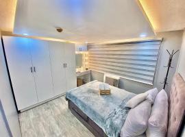 Cainta에 위치한 아파트호텔 IV’s Condo w/ Netflix, Wifi & Karaoke