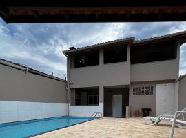 Casa de Praia com piscina, holiday home in Boicucanga
