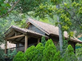 Camping Montagut - Cabane de fusta i bungalow
