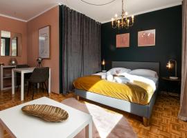 Schickes Boutique-Apartment, zentral in Messe-& Bahnhofsnähe, sehr ruhig & gratis Parkplatz - HappyStay, семеен хотел в Клагенфурт