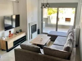 Eleusis Luxury Flat park in yard