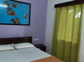 Cherry blossom guest house, hotelli kohteessa Arpora