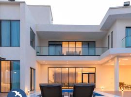 Byblos Villa Resort, būstas prie paplūdimio mieste Al Hadas