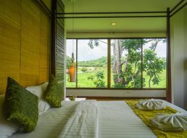 โรงแรมวิลลา พาราดี, hotel v destinaci Ban Khanong Phra Tai