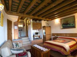 Apartamento rural El Pastor es un estudio con gran ventanal a Gredos, apartamento em Cabezas Bajas