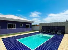 casa de praia com piscina e hidromassagem