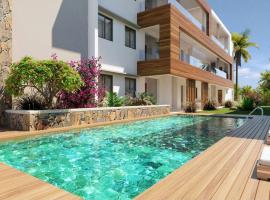 Soleia, Appt neuf de 2ch ds Residence piscine, 50m de la mer, hotel con piscina en Grand Baie