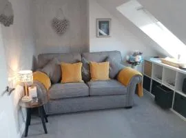Village life- Private Attic Suite - Living Room, Bedroom and Bathroom