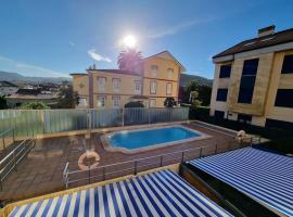 20A01 - Precioso apartamento con piscina y garaje، مكان عطلات للإيجار في La Arena
