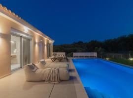 Spartakos Luxury Villa 5, rental pantai di Planos