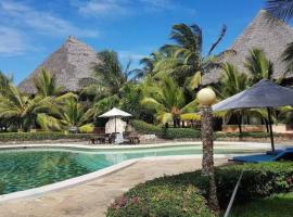 Baharini Beachfront Cottage, cabaña en Malindi