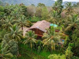 ama Stays & Trails Heliconia Villa, Wayanad, hytte i Wayanad