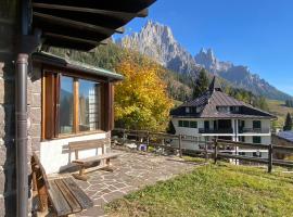 Casa Loria - Appartamento con Giardino, hotel in San Martino di Castrozza