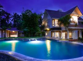 Royad Calicut Farm House - Premium Villa with Pool Inside a Farm, cabaña o casa de campo en Kozhikode