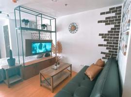 Black & Bold - 1BR Condo 50mbpsWIFI near SM Marilao, acomoda&ccedil;&atilde;o em condom&iacute;nio em Marilao
