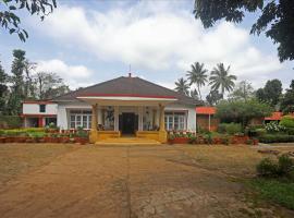 Devi Villa - Plantation Retreat and Forest Getaway, landsted i Kutta