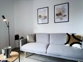 MILPAU Gladbeck 1 - Modernes und zentrales Premium-Apartment mit Privatparkplatz, Queensize-Bett, Netflix, Nespresso und Smart-TV