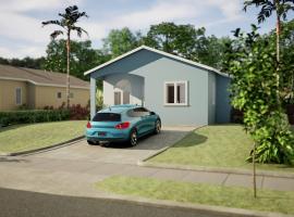 Escape to Paradise Brand New Bungalow with Ocean View in Discovery Bay 1, bungalow em Discovery Bay