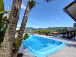 Casa com vista para o Cristo e piscina, недорогой отель в городе Encantado