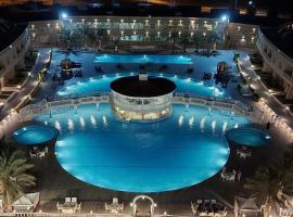 Al Salam Grand Hotel, отель в городе Эль-Бурайми