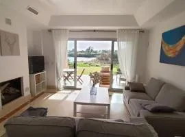 Sotogrande - Bright ground floor apartment with porch, garden and pool