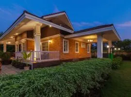 StayVista's Wandering Greens - Mountain-View Villa with Pool, Spacious Lawn & Balcony