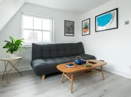 Central One-Bedroom, 99 Steps to the Sea