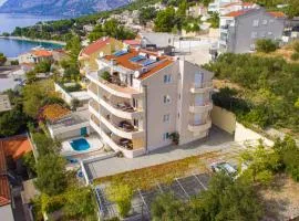 Family-friendly apartments with swimming pool Brela, Makarska - 20066